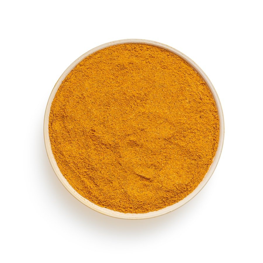 Ground turmeric powder in a bowl